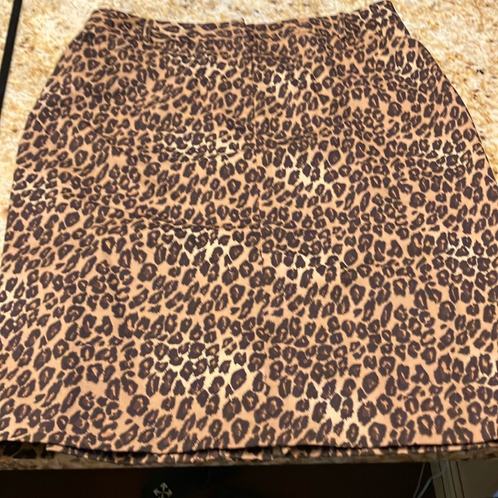 Knee length leopard skirt.  Size 14